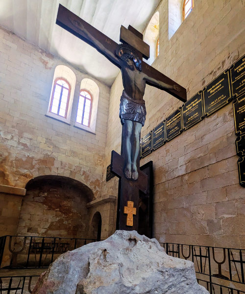 Crucifix fixed on a large stone from Calvary